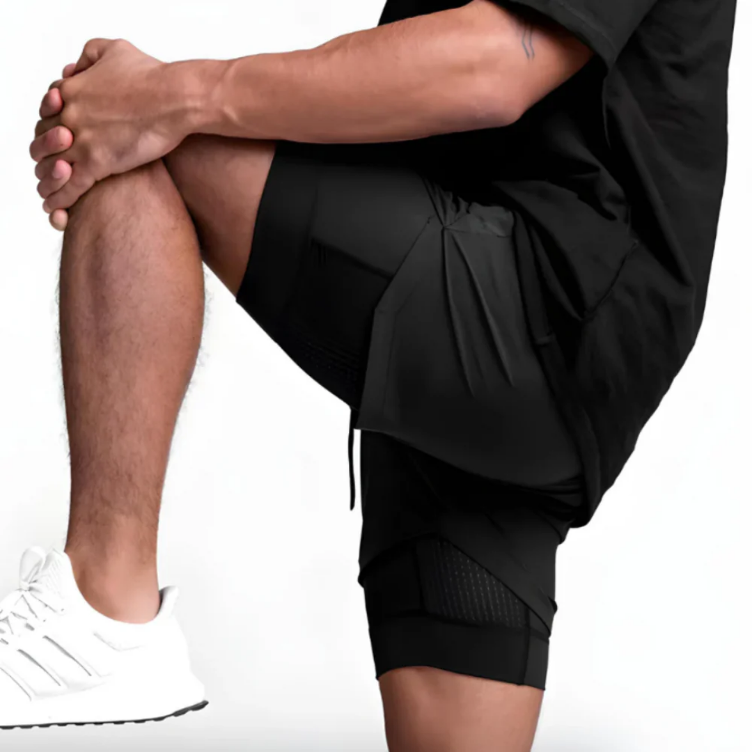 Northrun - 2-i-1 treningsshorts med sprettfri mobillomme.